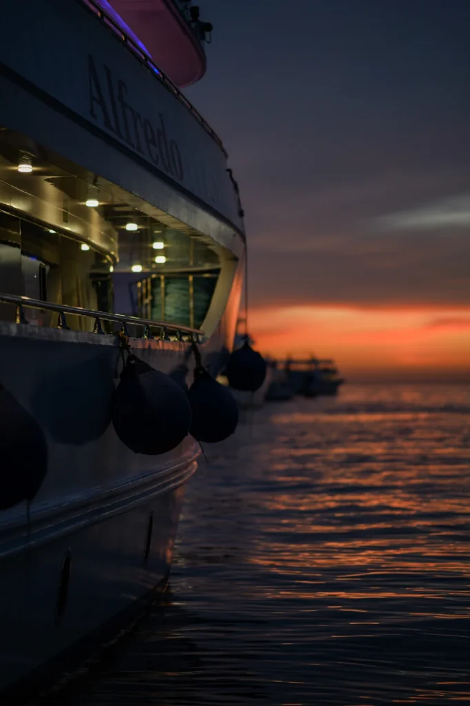 View along the side of ALFREDO at sunset